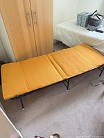 Bed fully opened showing mattress surface