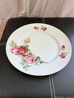 Front view showing full floral pattern on white plate