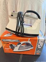 Proctor Silex steam iron coiled cord on its original box