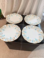 Top view of all four matching Rocaille plates
