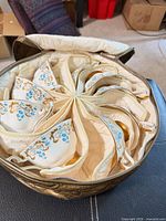 Padded carrier holding eight Rocaille teacups