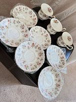 Overview of 3 teacups and 6 saucers with Winsome pattern