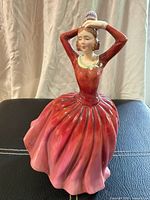 Front view of Katrina figurine showing dress and pose