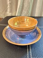 tea cup placed on saucer showing color contrast