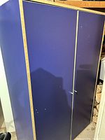 front view of blue laminate double door wardrobe