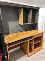 Front view of desk and hutch showing overall structure, shelves, drawer and cubbies