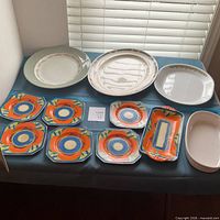 Full lot layout showing all 11 ceramic pieces
