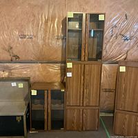 Tall cabinet and short wine cabinet side by side