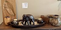 Full view of lot showing all decor pieces on shelf