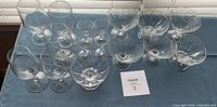All 16 stemware pieces grouped on table