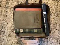 Top view of bag showing multiple hardcovers