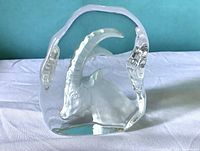 Front view showing frosted ram head within clear crystal block
