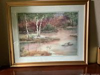 Front view of framed Owen Wexler watercolor print in gold frame
