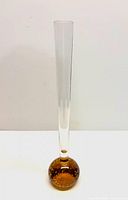 Full view of bud vase showing clear neck and amber bubble base