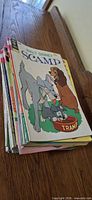 Stack of comics topped by Walt Disney’s Scamp