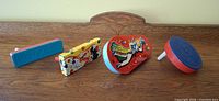 Group shot of all four noisemakers arranged side by side
