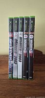 Spines of all five Xbox game cases