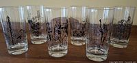 Six commemorative Massachusetts Bicentennial glasses front view