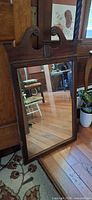 Front view showing full mirror and frame
