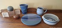 Group shot showing all six pottery pieces on tabletop