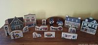 Group shot of all wooden buildings and accent pieces