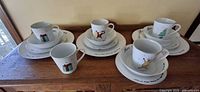 Entire dish set arranged on wooden surface