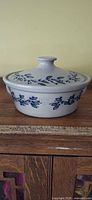 Full view of casserole with lid showing pattern and scale