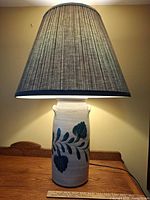Full view of lamp with shade showing overall design and size reference