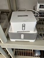 Front view of stacked Sonos Connect and Connect:Amp
