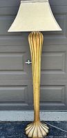 Full view of lamp with shade showing gold ribbed column and square shade