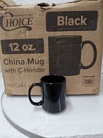 Choice box marked 12 oz China Mug with C-Handle Black 36/Case alongside one black mug