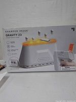 Front view of boxed Sharper Image Gravity Z3 Hover Target Game