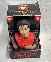 Front view of boxed Michael Jackson Thriller rubber duck showing figure and packaging