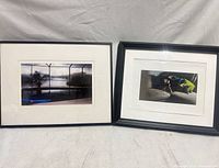 Both framed photographs side by side showing frames and mats