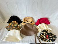 All eight bucket hats arranged for full view of colors and styles