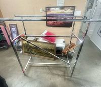Full view metal double rack with two bars and diagonal support