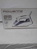Front of box showing Rowenta Autosteam steam iron image and model DW4060