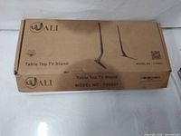 Front of sealed retail box showing brand, product name, model and 110 lb max