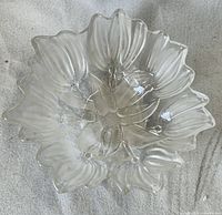 Top view of clear glass tulip bowl showing petal design