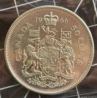 Reverse showing Canadian coat of arms and date 1966