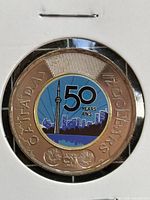 Obverse side of 2026 coloured CN Tower $2 coin in 2×2 holder
