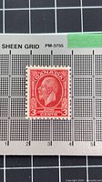 Front of 3¢ red Ottawa Conference 1932 King George V stamp on measurement grid