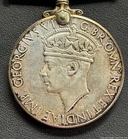 Obverse of silver Canadian War Medal 1939-1945 with suspension bar