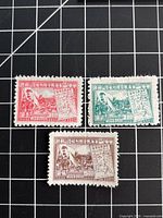 All three 1949 Republic of China stamps showing colours and denominations