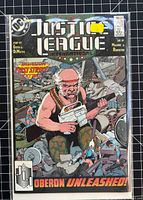 Front cover in bag showing title, artwork, and issue details
