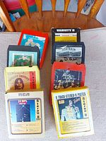 All eight 8-track tapes arranged two rows front view