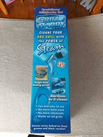 Front view of Grill Daddy boxed steam cleaner