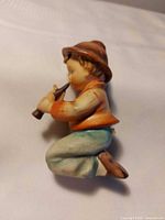 Left side profile of figurine