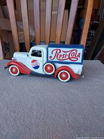 Side view showing Pepsi-Cola graphics and overall paint scheme