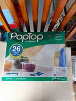 Front of Homz PopTop Storables 26-piece set box